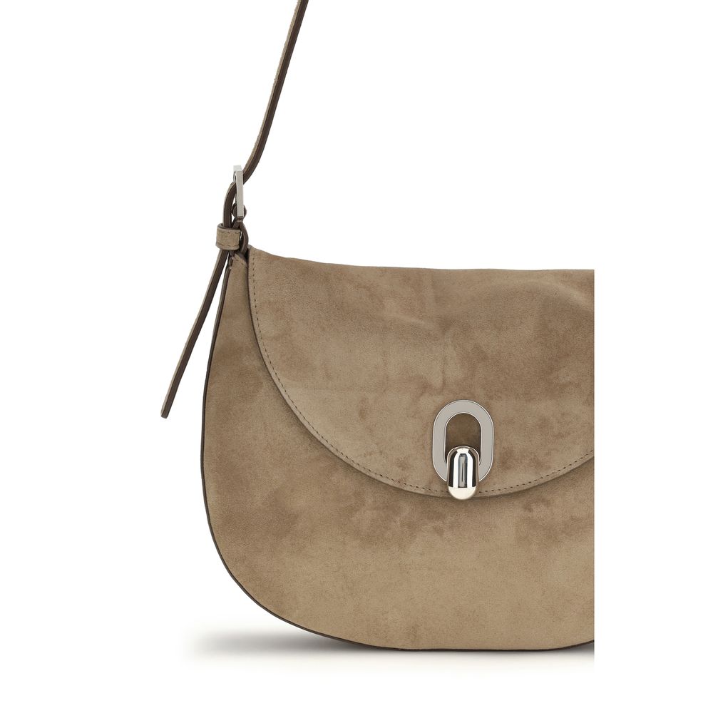 Savette beige suede hobo shoulder bag with curved silhouette and adjustable shoulder strap open close button detail
