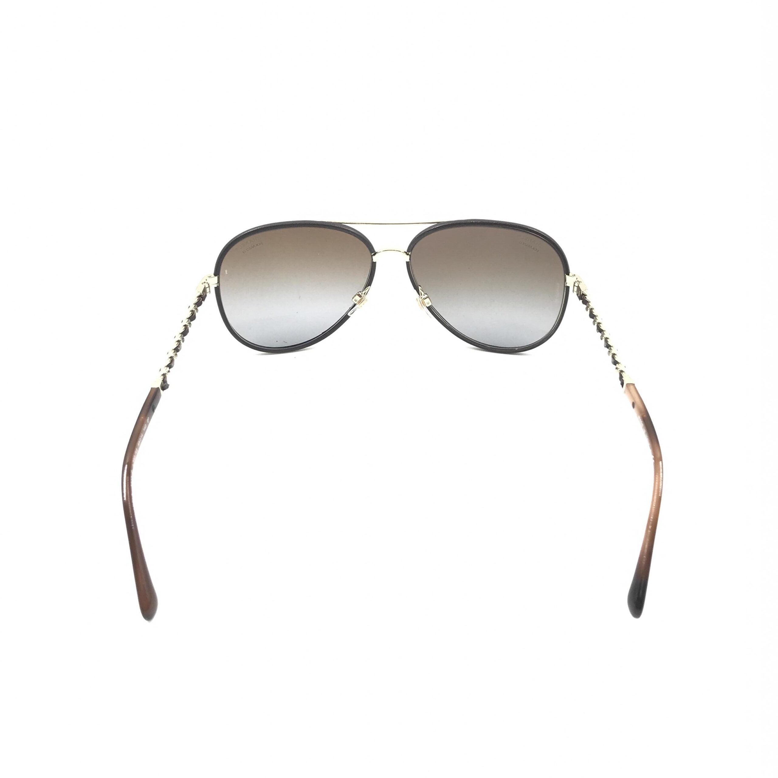 Pre-loved Chanel gold and black polarized aviator sunglasses with protective case