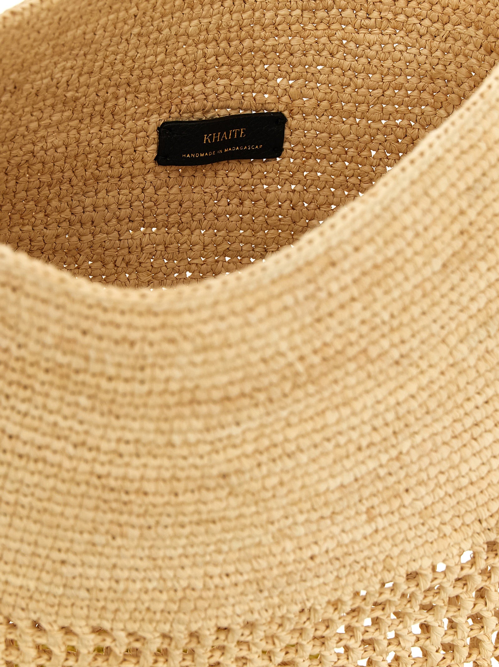 Khaite Billie beige woven sisal bucket bag with adjustable calf leather shoulder strap