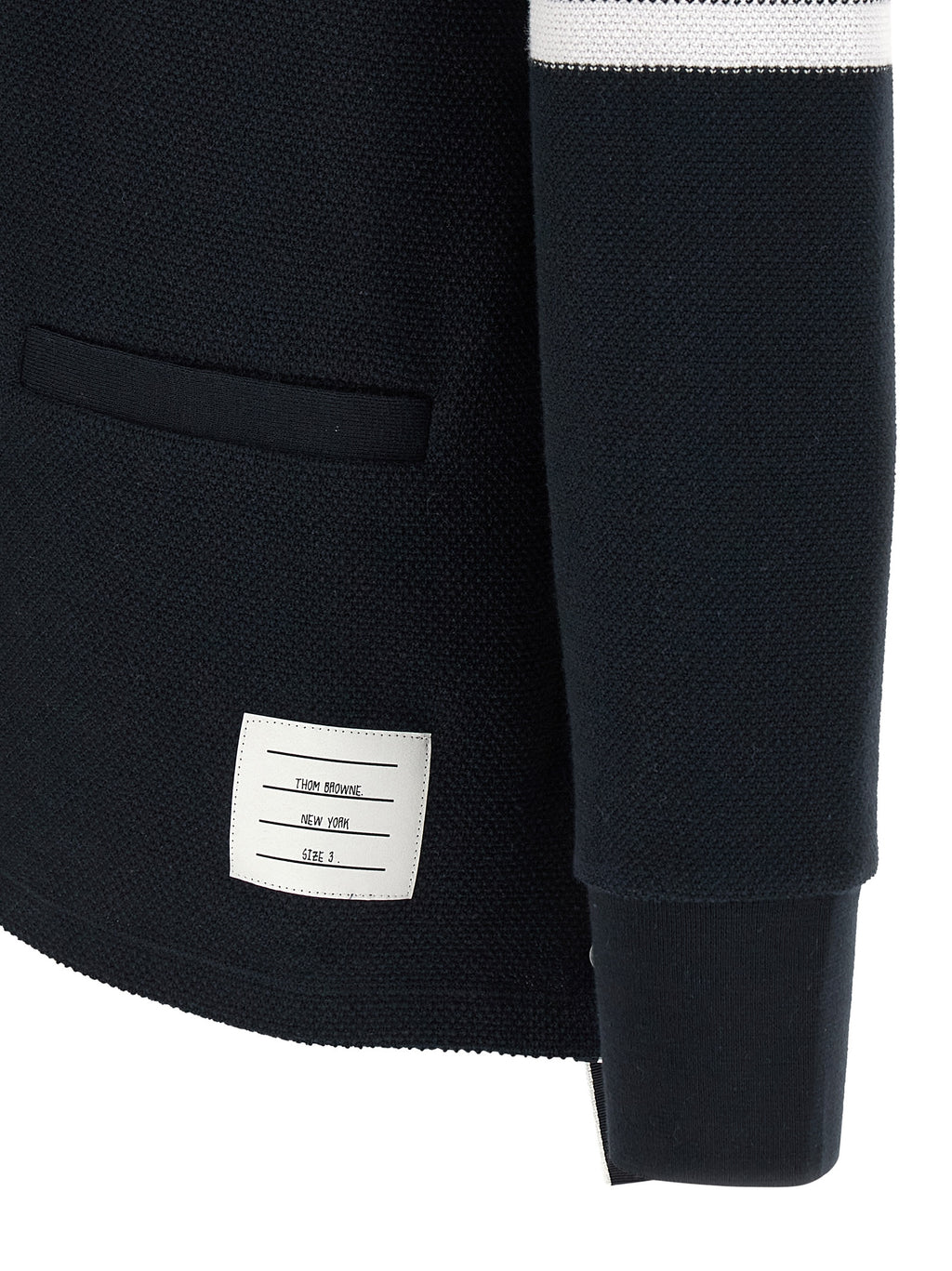 Thom Browne blue honeycomb cotton cardigan with four-bar stripe — close up sleeve view