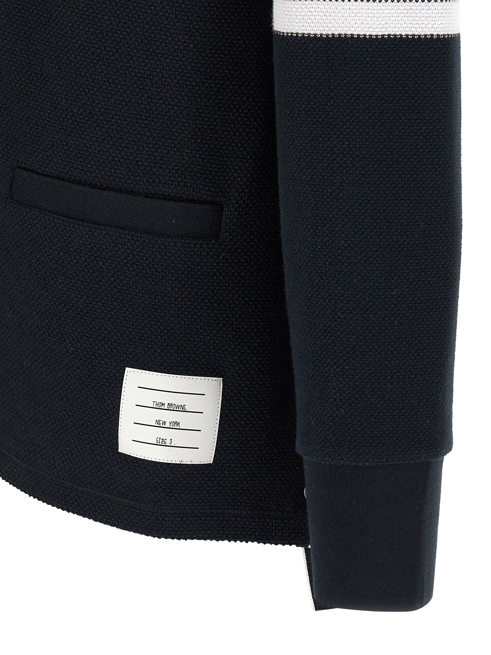Thom Browne blue honeycomb cotton cardigan with four-bar stripe — close up sleeve view