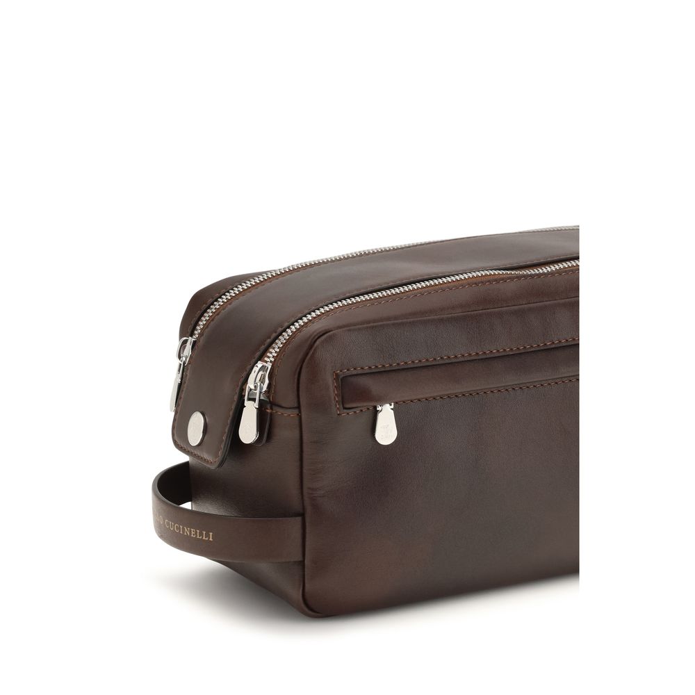 Brunello Cucinelli brown calfskin leather beauty case — close up view