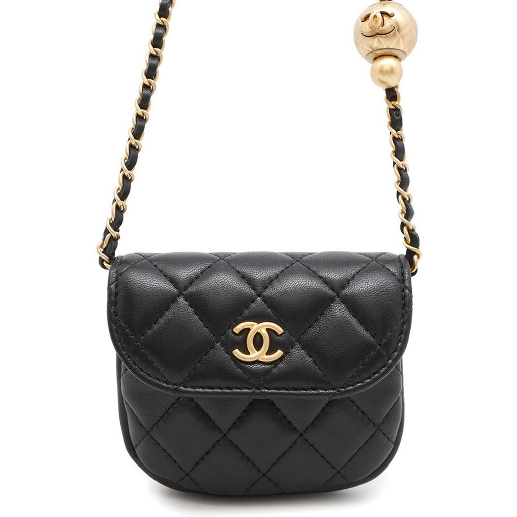 MANSII Chanel used Ball Bag in black quilted leather with gold hardware and unique chain strap
