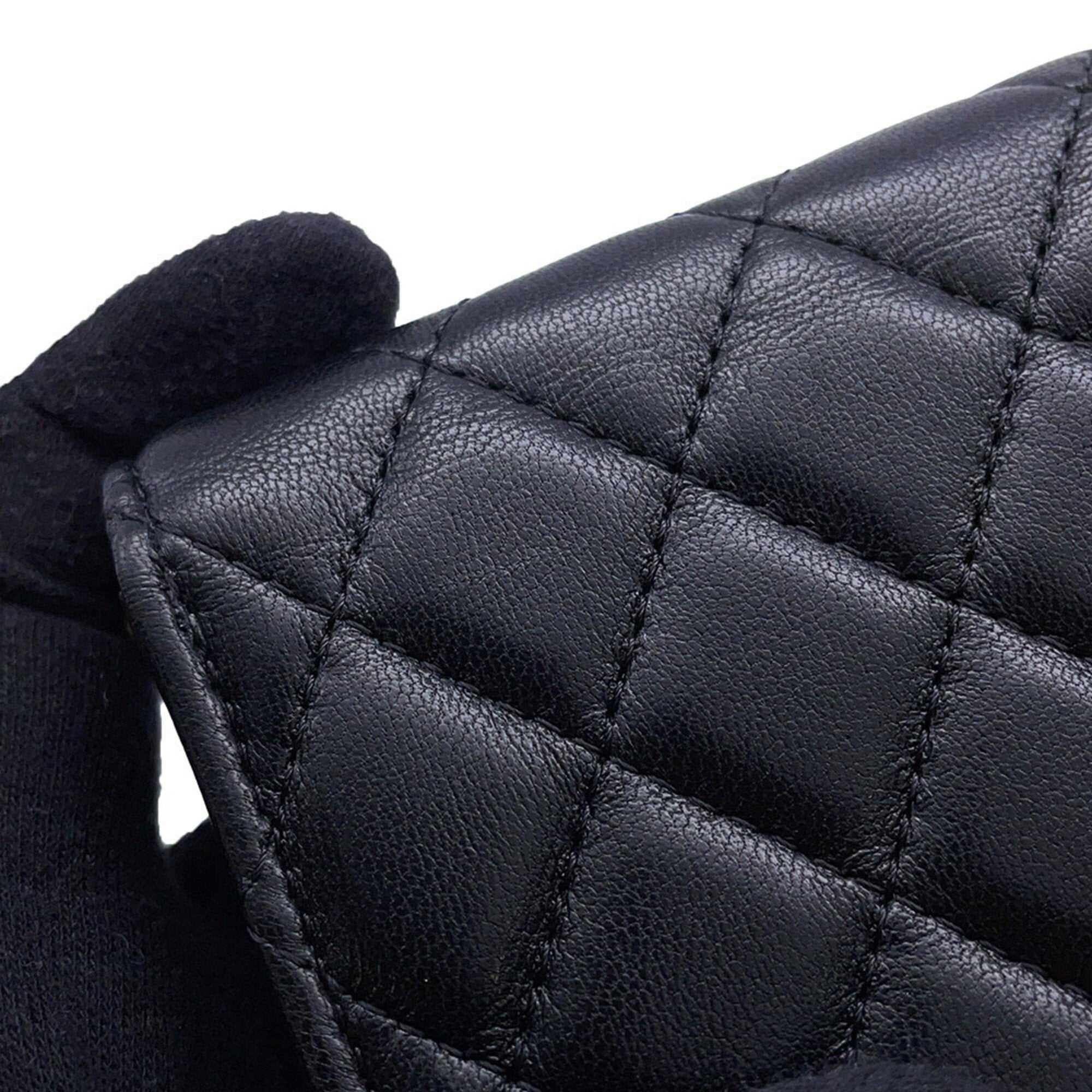 Close-up of the textured leather of a Chanel used Ball Bag with quilted design