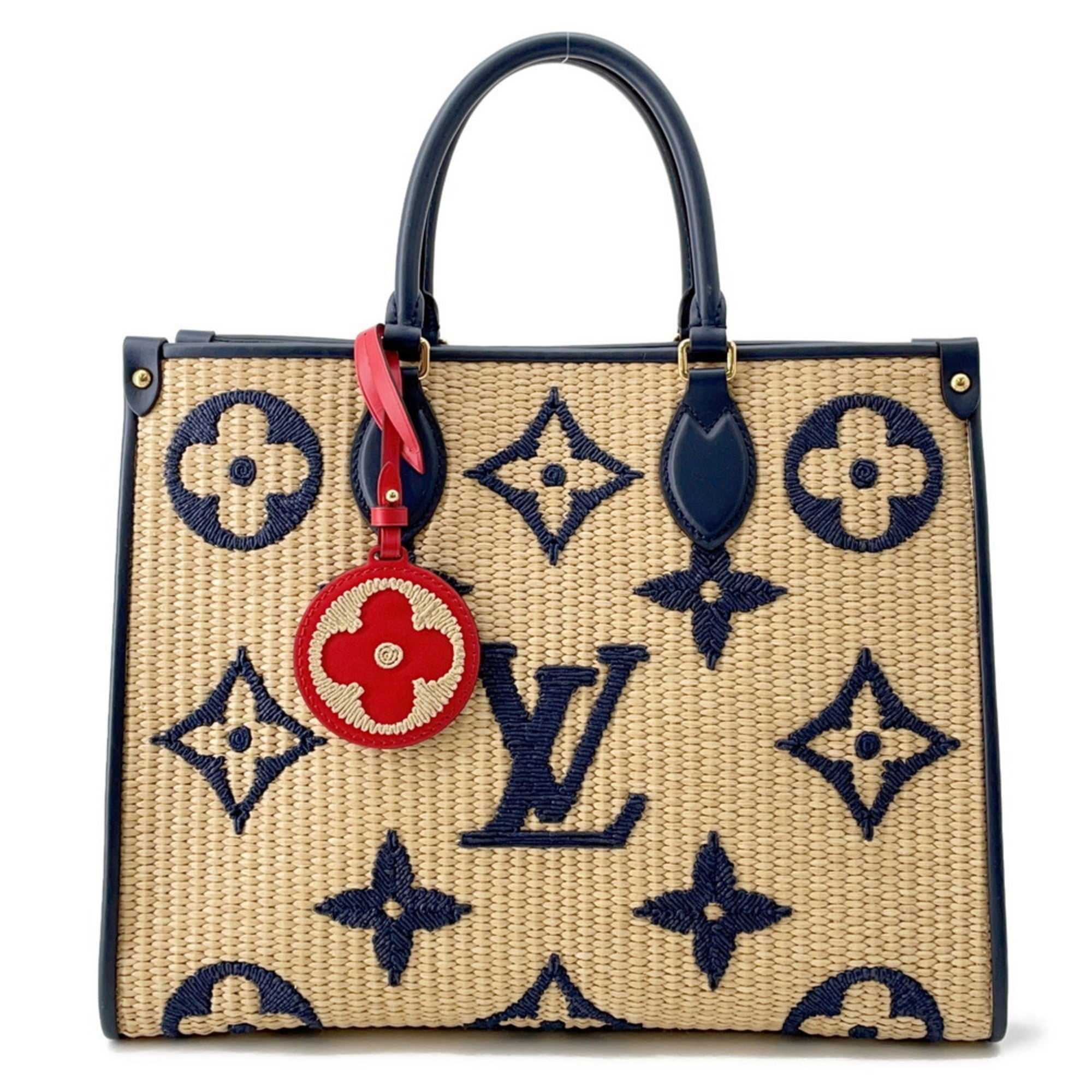 LOUIS VUITTON Pre-Loved Monogram Raffia On-the-Go tote bag featuring a stylish design and detachable charm