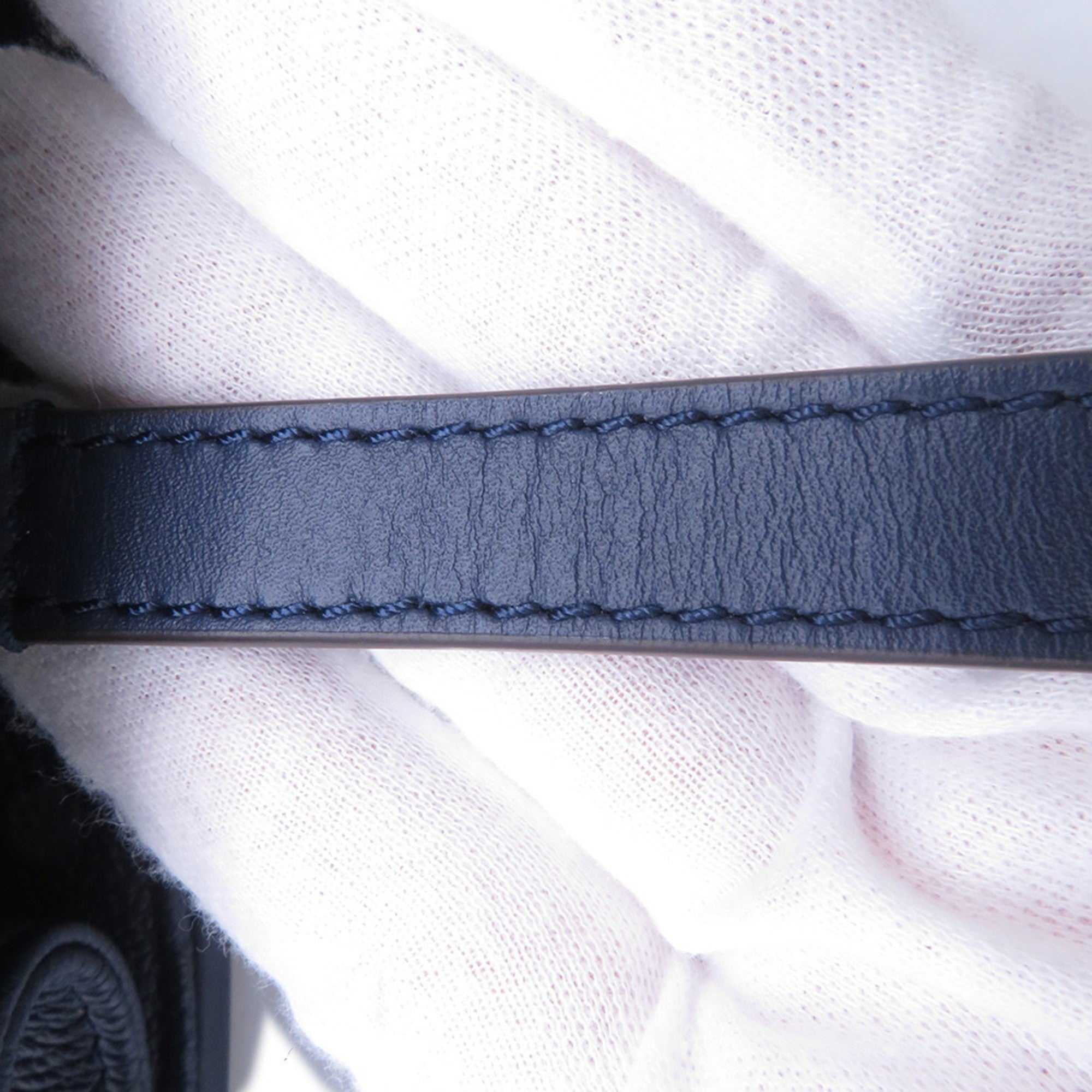 Close-up of the strap detailing on the LOUIS VUITTON Pre-Loved Monogram Raffia On-the-Go tote bag