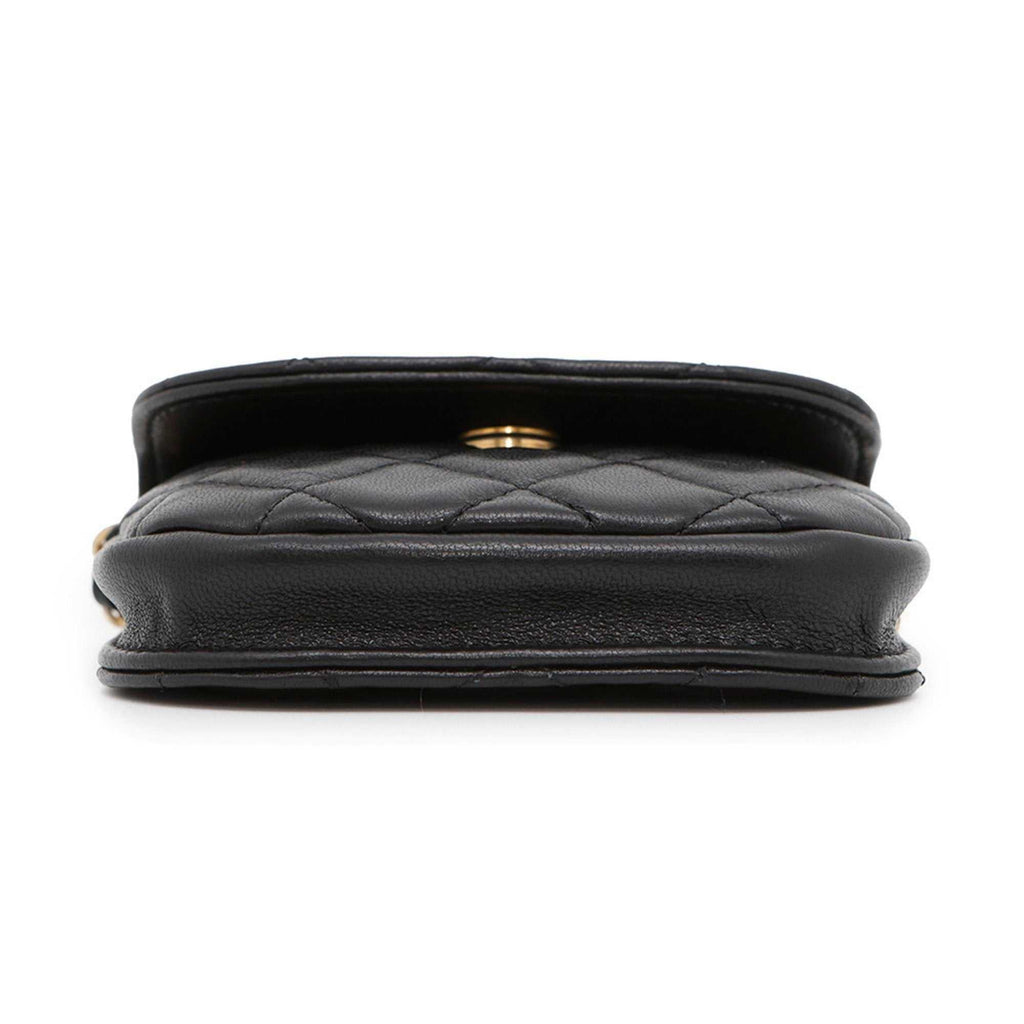 MANSII Chanel used Ball Bag in black leather with quilted design and gold-tone accents