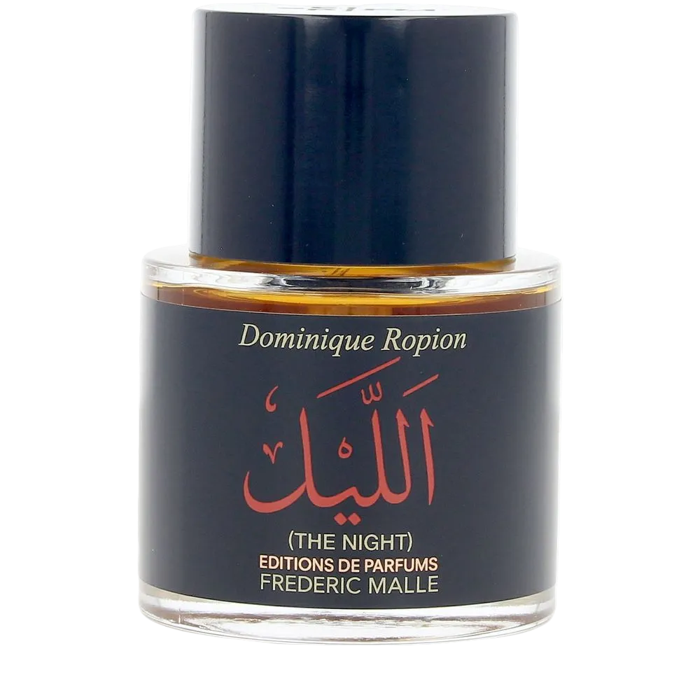 Perfume bottle labeled 'The Night' by Frederic Malle on a white background
