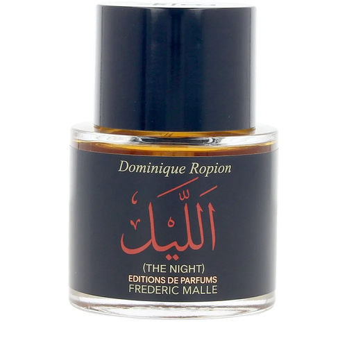 Perfume bottle labeled 'The Night' by Frederic Malle on a white background