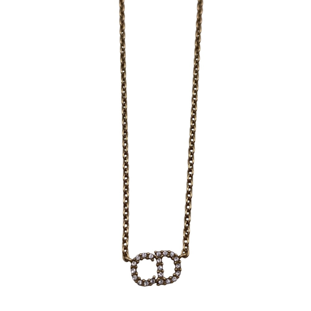 Elegant gold chain necklace featuring authentic Dior jewelry for sale with CD logo pendant