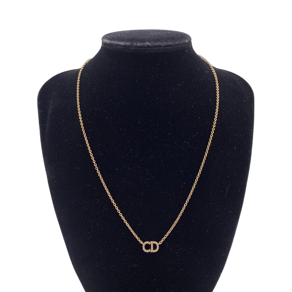 Elegant gold Christian Dior necklace featuring a CD logo, authentic Dior jewelry for sale