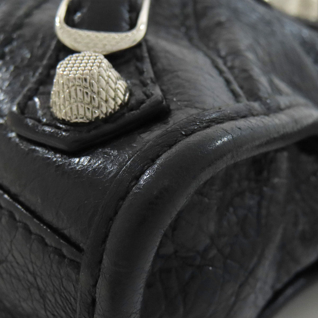 Close-up of a Balenciaga black vintage bag showcasing detailed stitching and hardware
