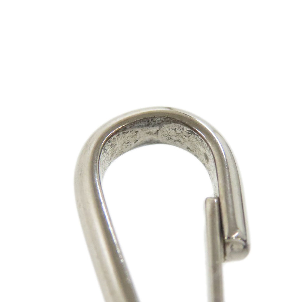 BALENCIAGA vintage bag detail showing the unique metal clip design for added style