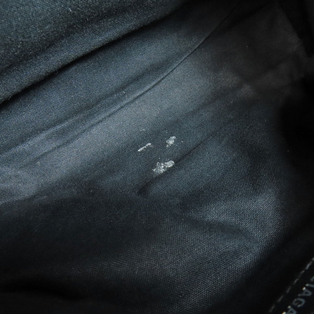 Interior of a BALENCIAGA bag showcasing a vintage design with subtle wear details