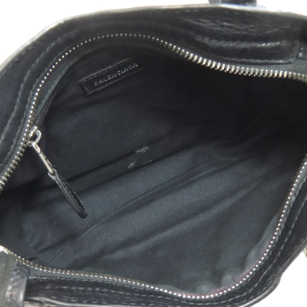 Inside view of BALENCIAGA vintage bag showcasing spacious black interior with zipper closure