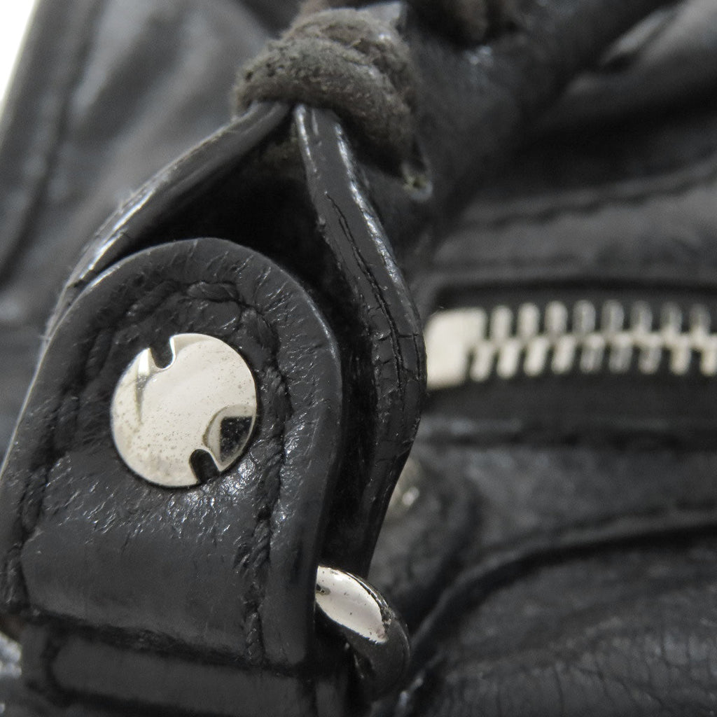 Close-up of a Balenciaga Vintage Bag showcasing the metallic hardware and textured leather detail