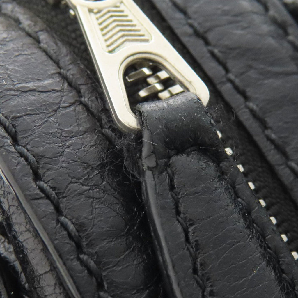 Close-up of BALENCIAGA Vintage bag zipper featuring premium black leather texture
