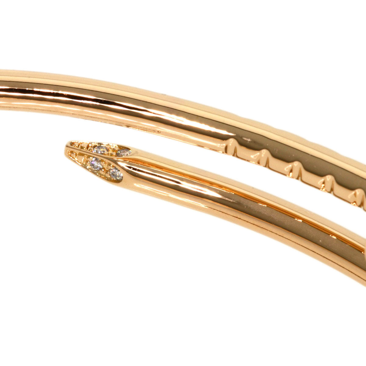Close-up of the Cartier Juste un Clou bracelet for sale with a sleek nail design and sparkling details