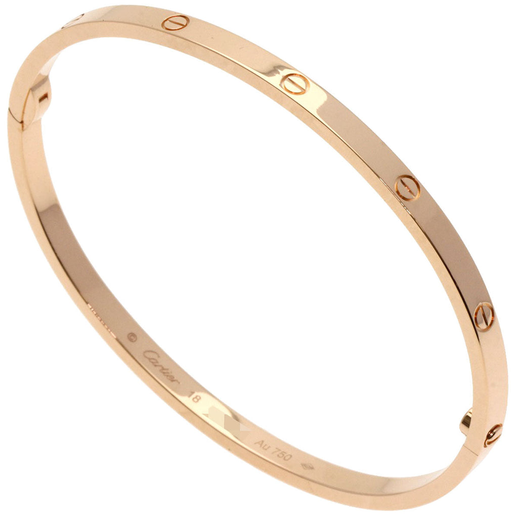 Cartier Love bracelet used in rose gold featuring iconic screw motifs and a sleek design