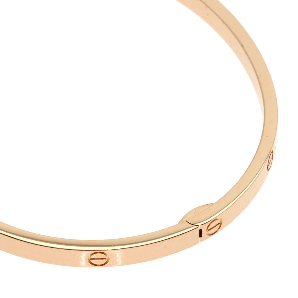 Gold Cartier Love bracelet used featuring the iconic screw motif design for timeless elegance