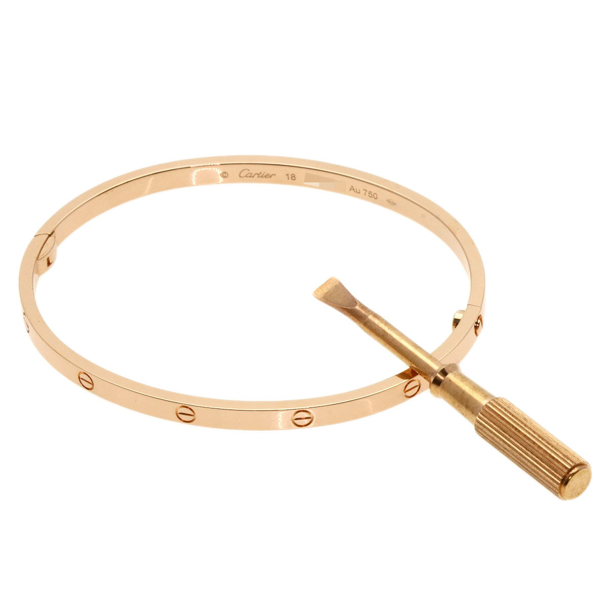 Cartier Love bracelet used, gold design with screwdriver for secure fastening, elegant accessory
