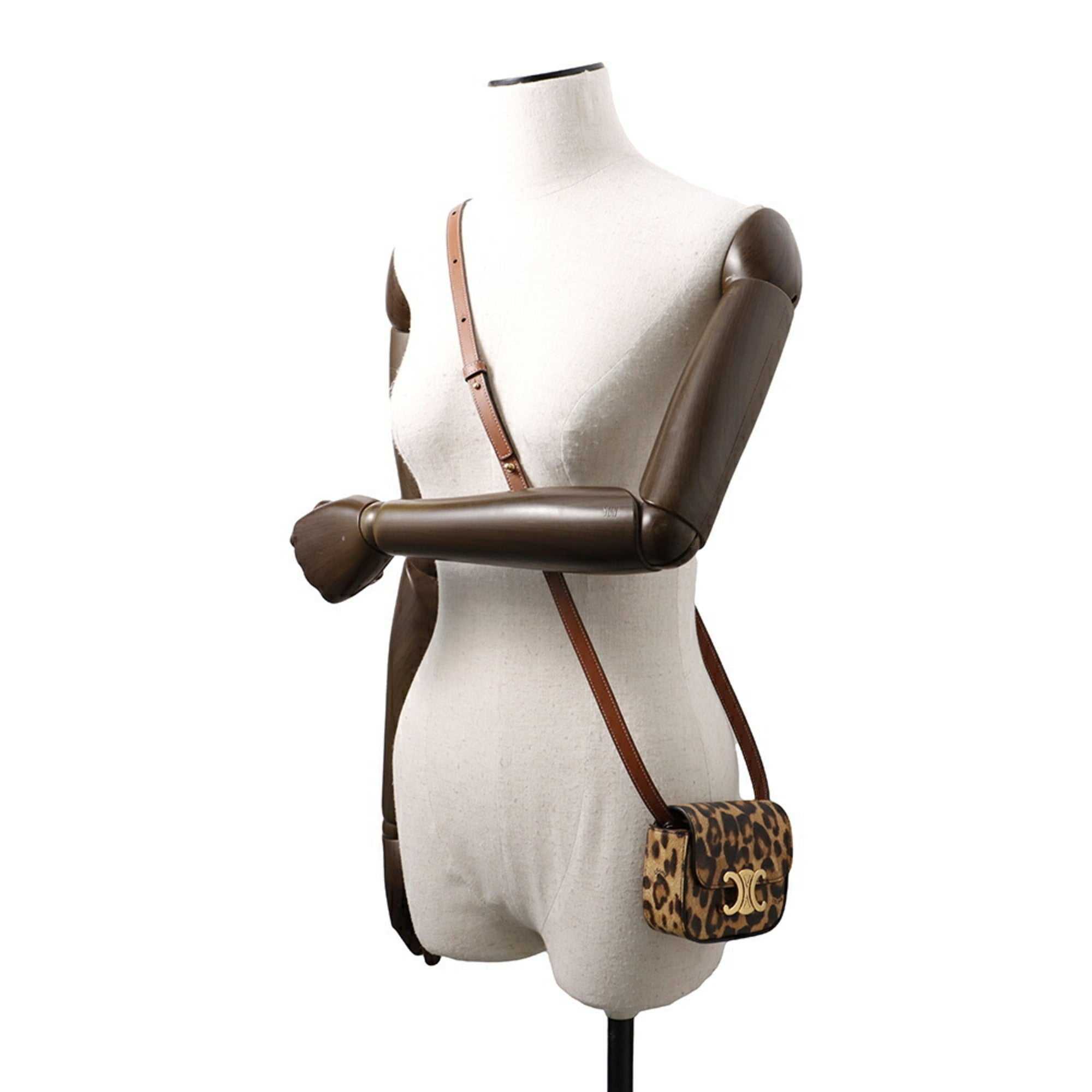 CÉLINE Pre-Loved Mini Claude crossbody bag in leopard print with adjustable strap for stylish outings