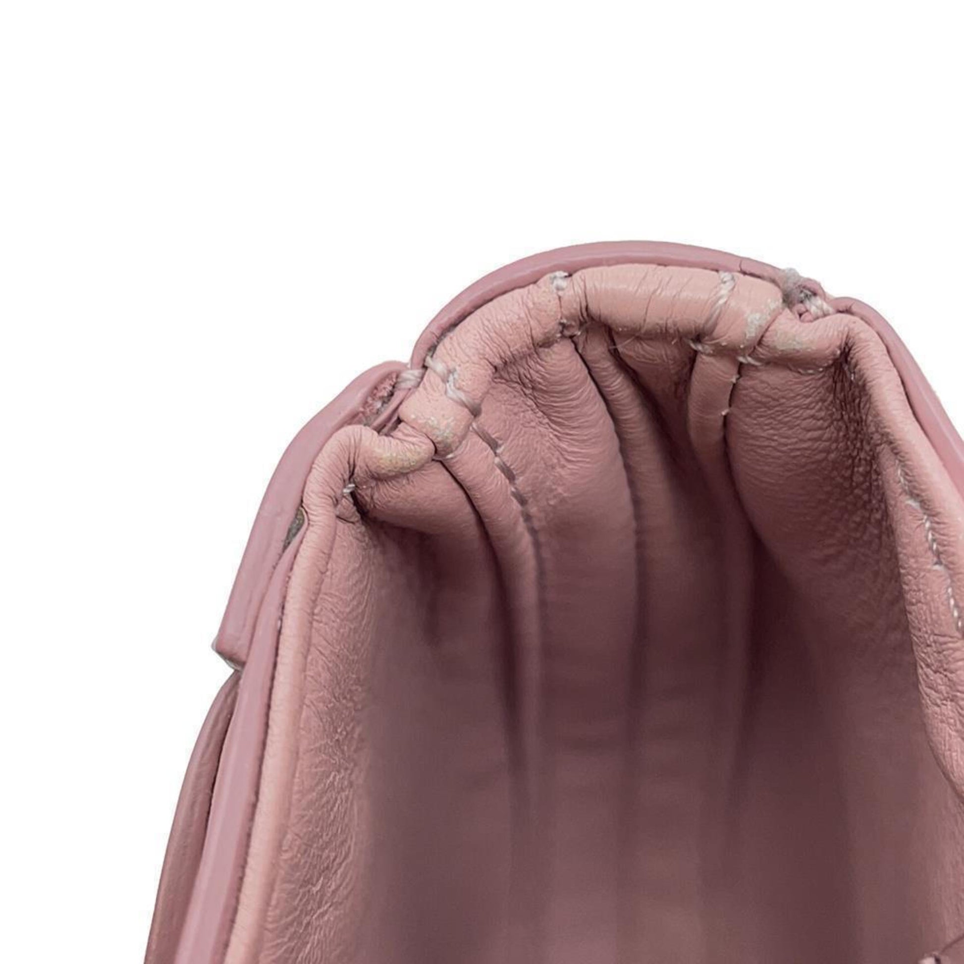 Inside view of a pre-loved Celine bag showcasing soft leather lining and interior structure