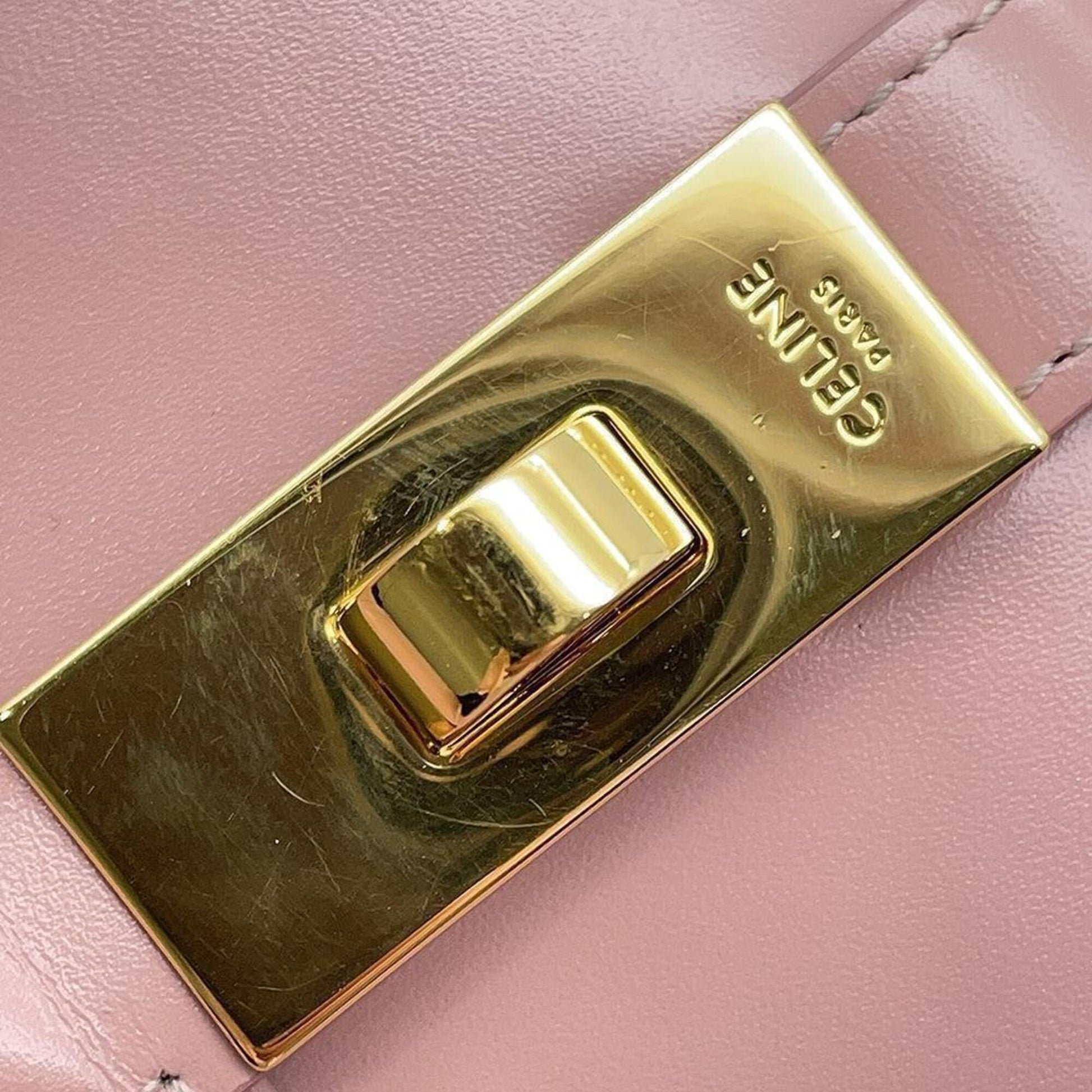 Celine pre-loved bag featuring a polished gold clasp for a stylish and elegant look