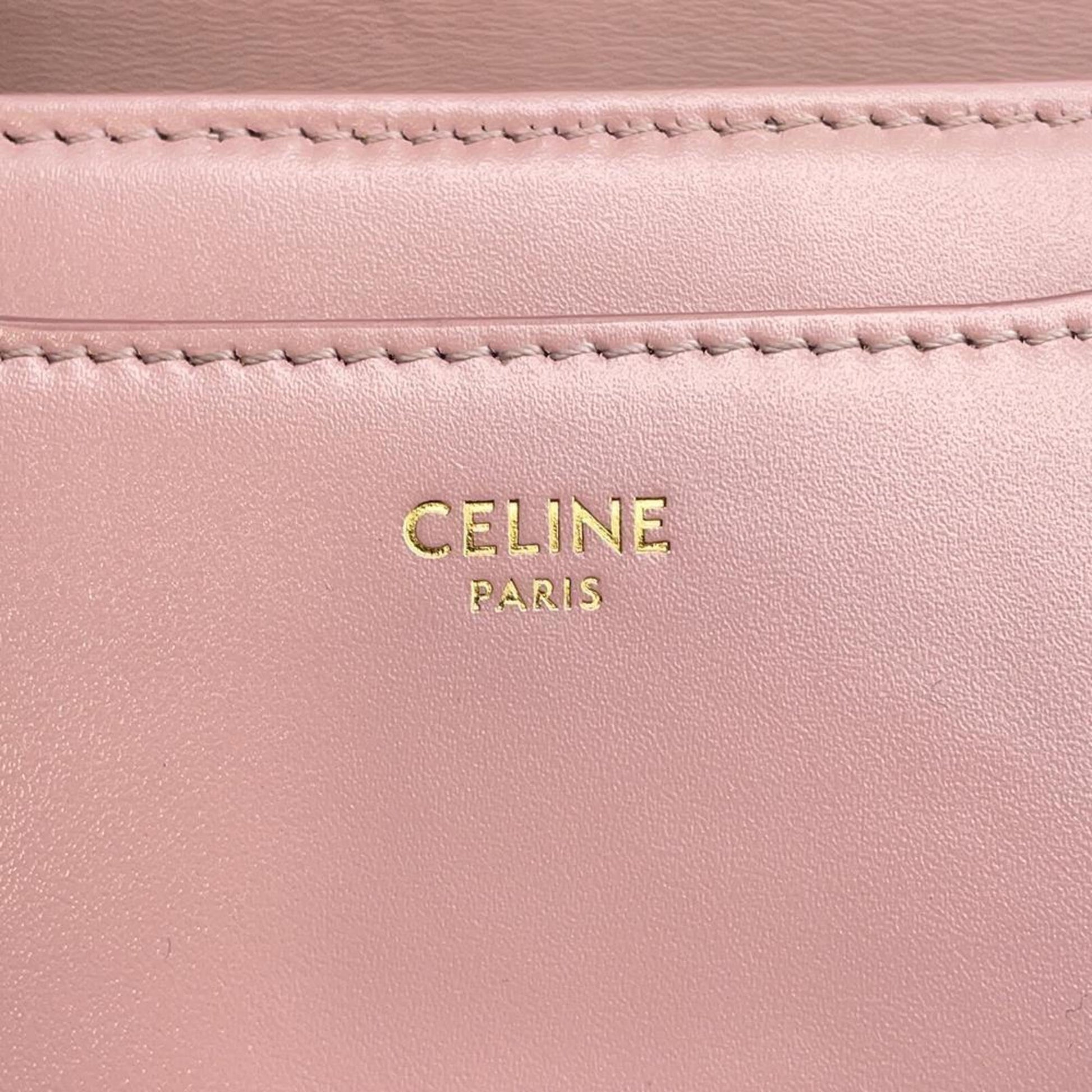 Celine pink leather bag with gold embossed logo, a stylish pre-loved accessory