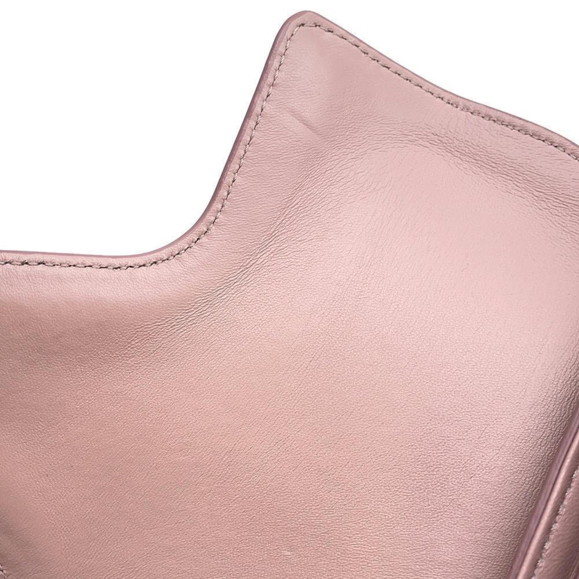 Celine pre-loved leather bag in soft pink color with unique design details