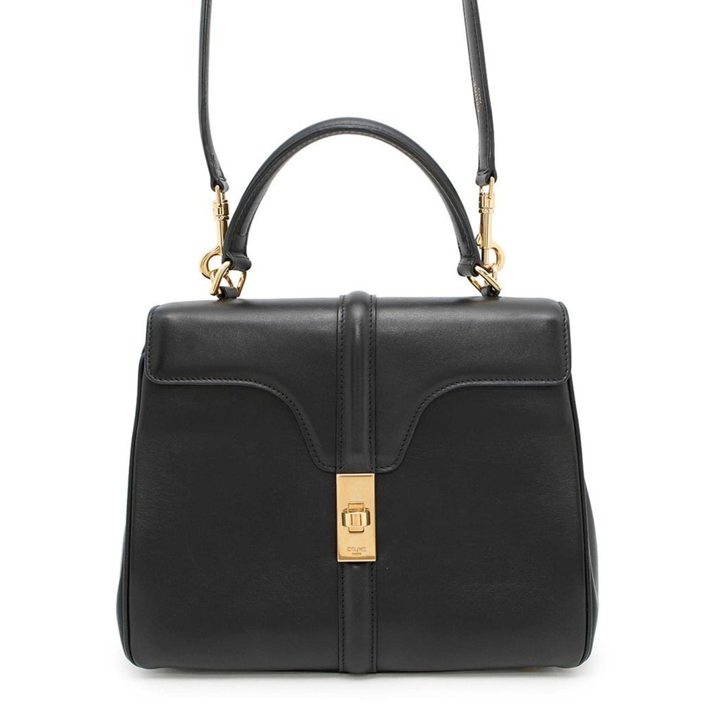 MANSII CÉLINE Pre owned 16 Seize black leather handbag with top handle and adjustable strap