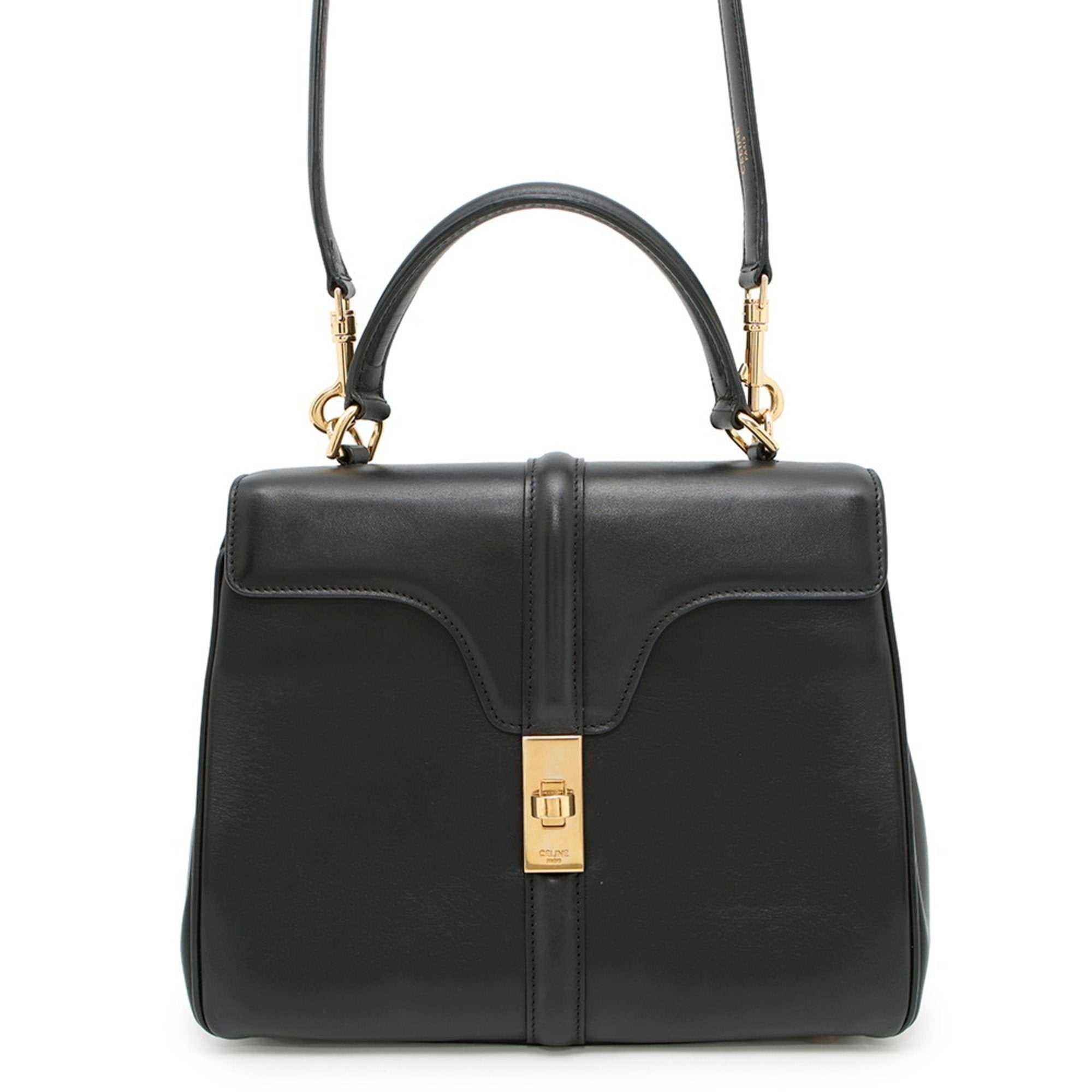 MANSII CÉLINE Pre owned 16 Seize black leather handbag with top handle and adjustable strap