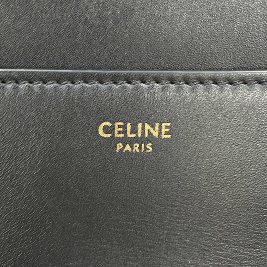 CÉLINE Pre owned 16 Seize Black Leather with Gold Detailing for Luxury Fashion Lovers