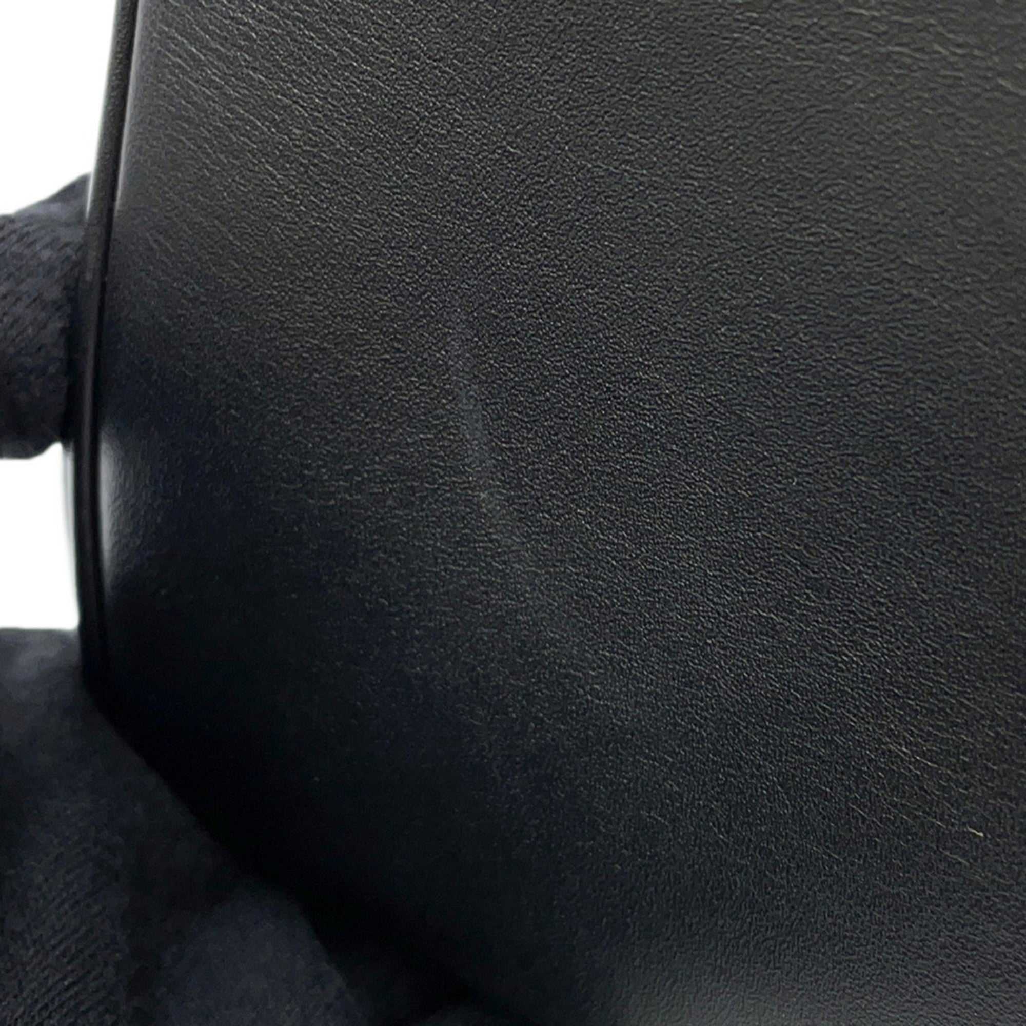 Close-up of the black leather CÉLINE Pre owned 16 Seize showing detailed texture and quality workmanship