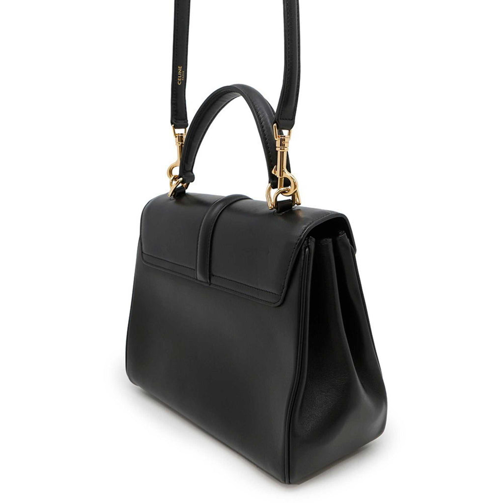 MANSII CÉLINE Pre owned 16 Seize handbag in black leather with gold-tone hardware
