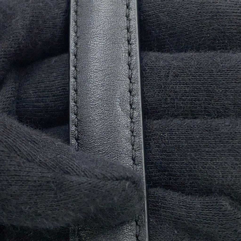 Close-up of MANSII CÉLINE Pre owned 16 Seize leather detailing showcasing quality stitching and texture