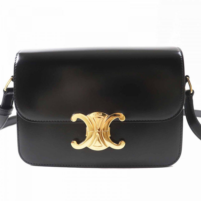 CELINE pre-owned black leather bag with gold-tone logo and adjustable strap for stylish carry