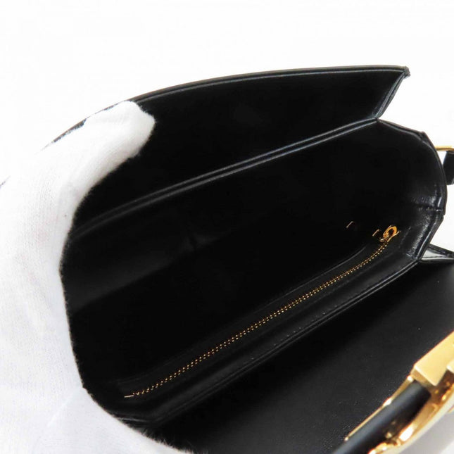 Interior view of a CELINE pre-owned bag showcasing spacious compartments and zipper pockets