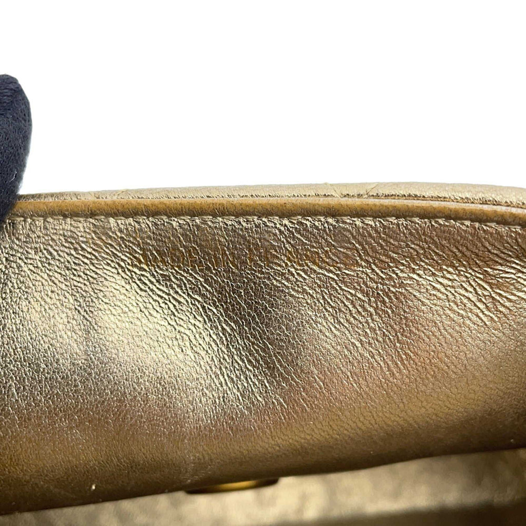 Authentic Chanel Matelasse 18 for sale featuring a luxurious gold finish and elegant design details