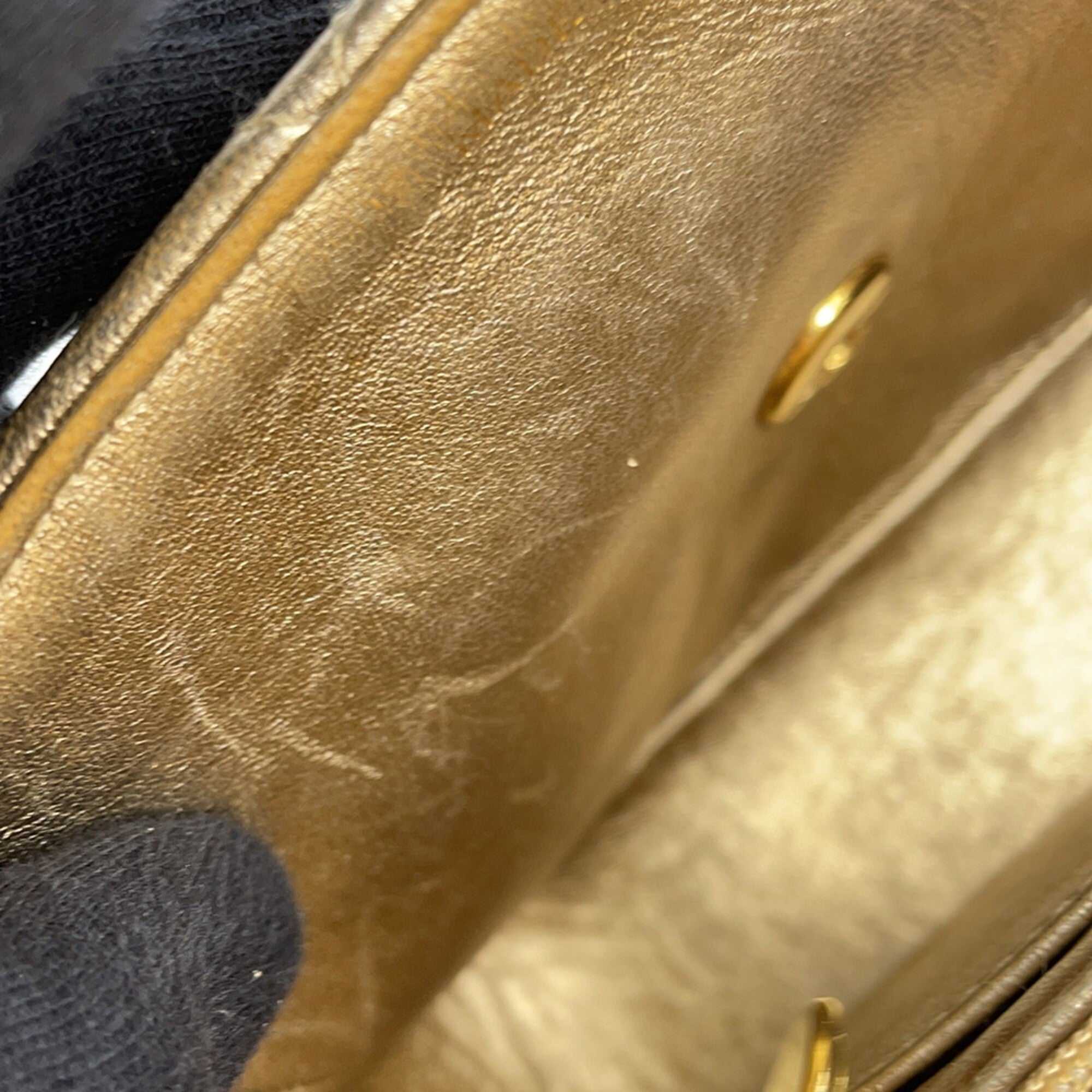 Close-up of the interior of an authentic Chanel Matelasse 18 for sale showcasing high-quality leather and stitching