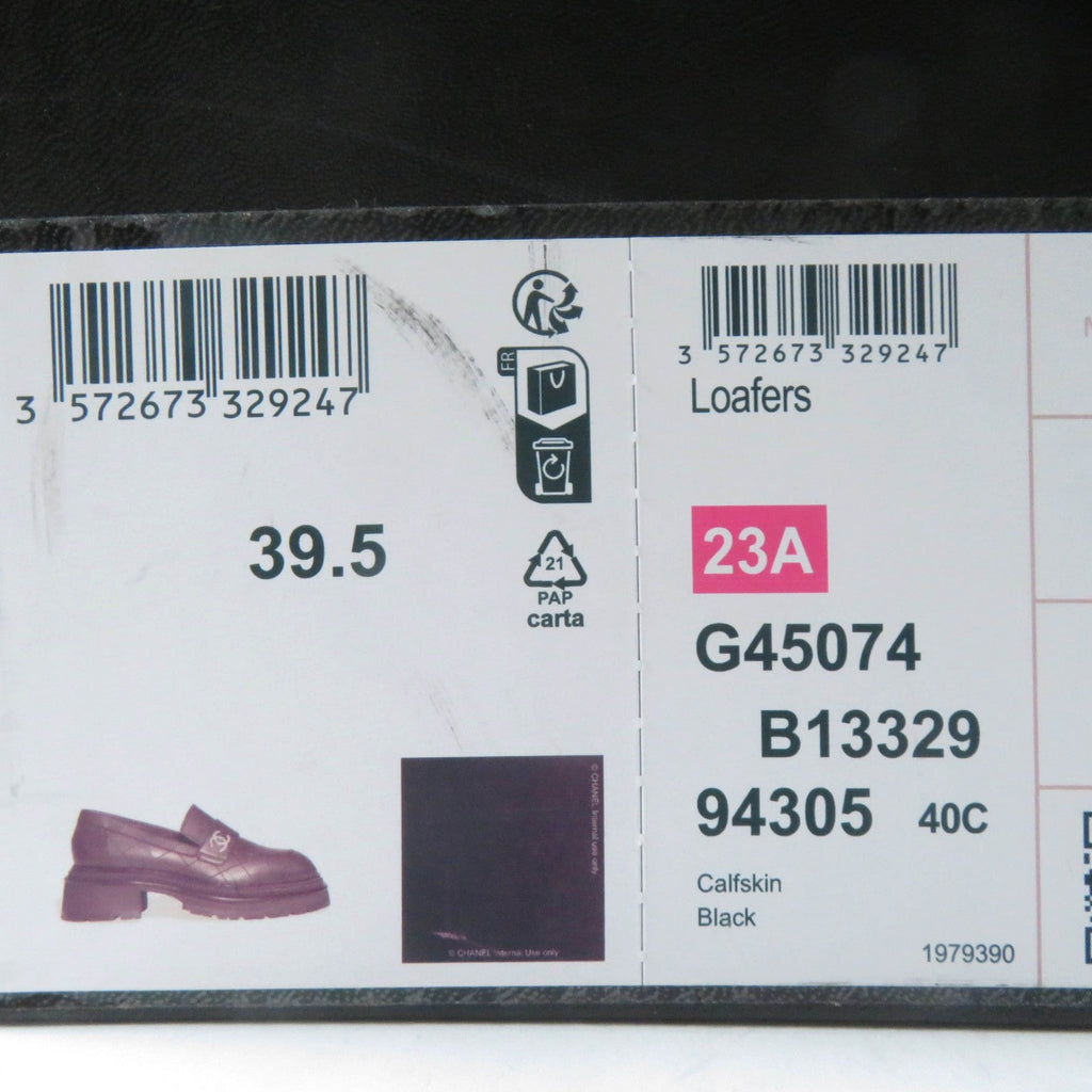 Used Chanel loafers women in black calfskin with a classic design for stylish comfort