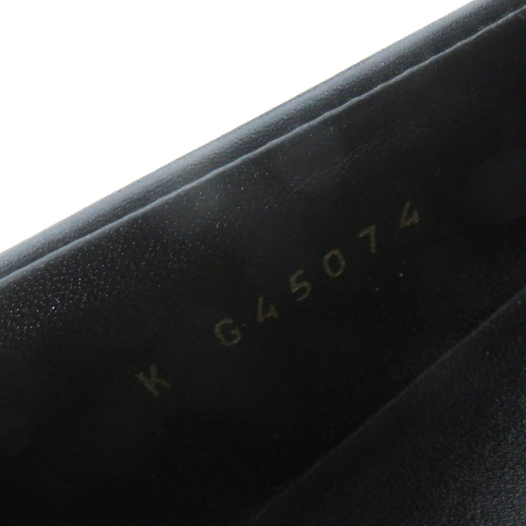 Close-up of used Chanel loafers women with logo detailing and classic design for stylish comfort