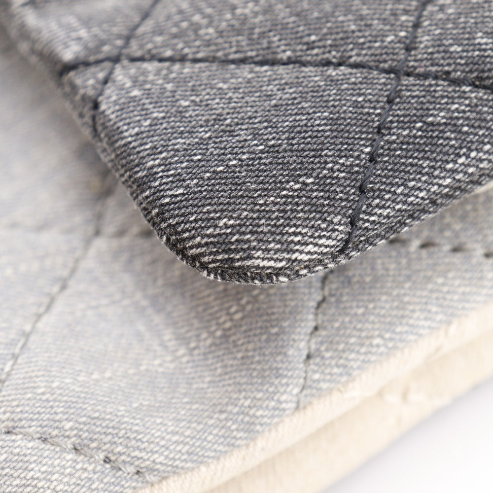 CHANEL Quilted Bag in Fair Condition with Gray Denim Texture and Stylish Design