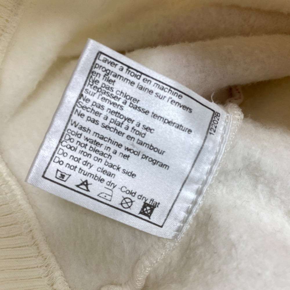 Care label for CHANEL No 5 sweater pre-loved showing washing instructions and fabric details