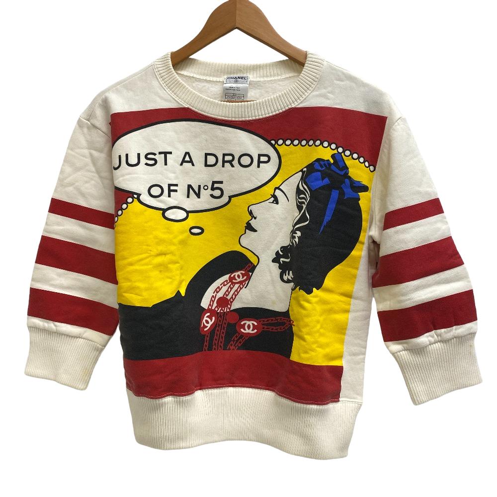 CHANEL No 5 sweater pre-loved featuring bold graphic design and striped sleeves for a unique style