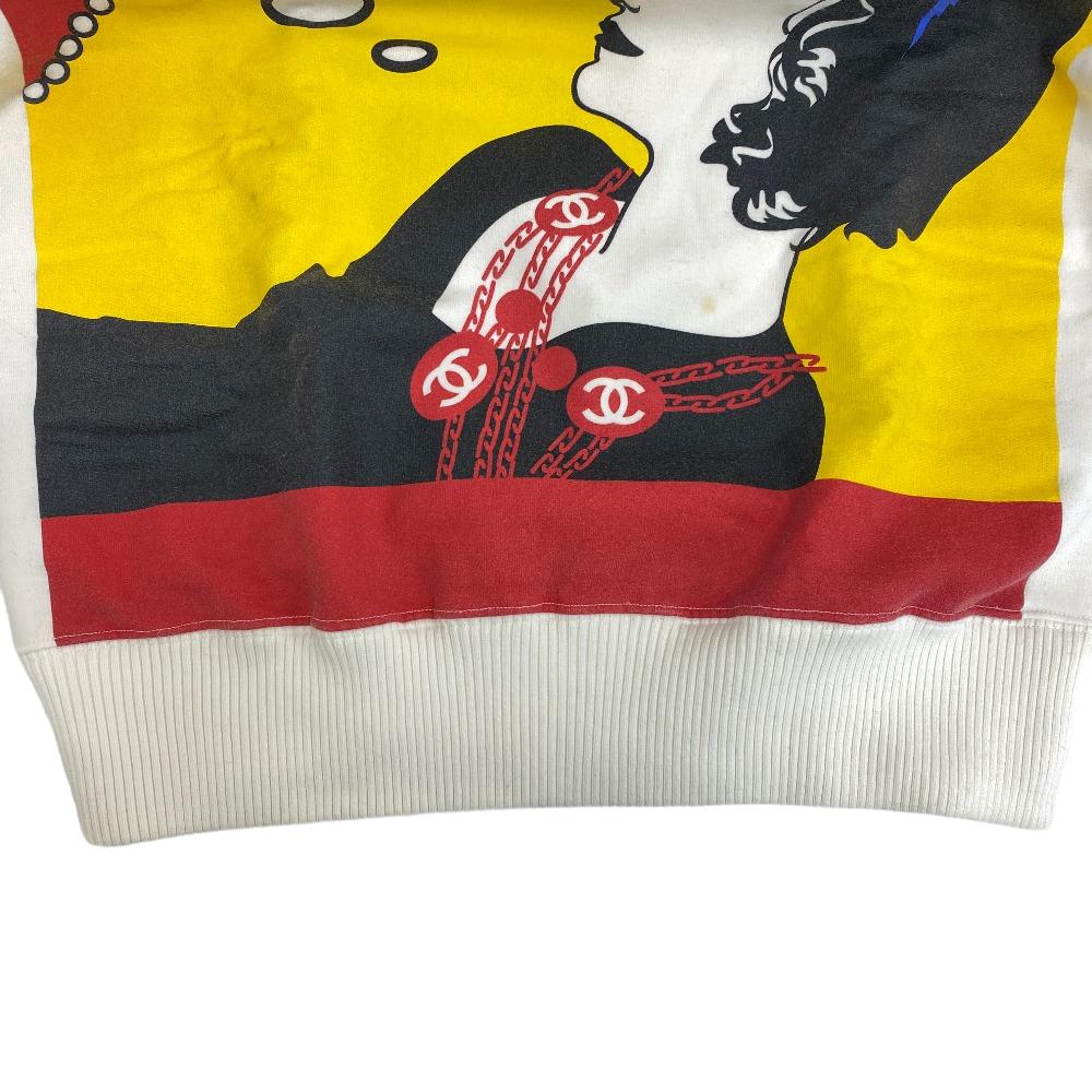 CHANEL No 5 sweater pre-loved featuring a vibrant graphic design and comfortable fit
