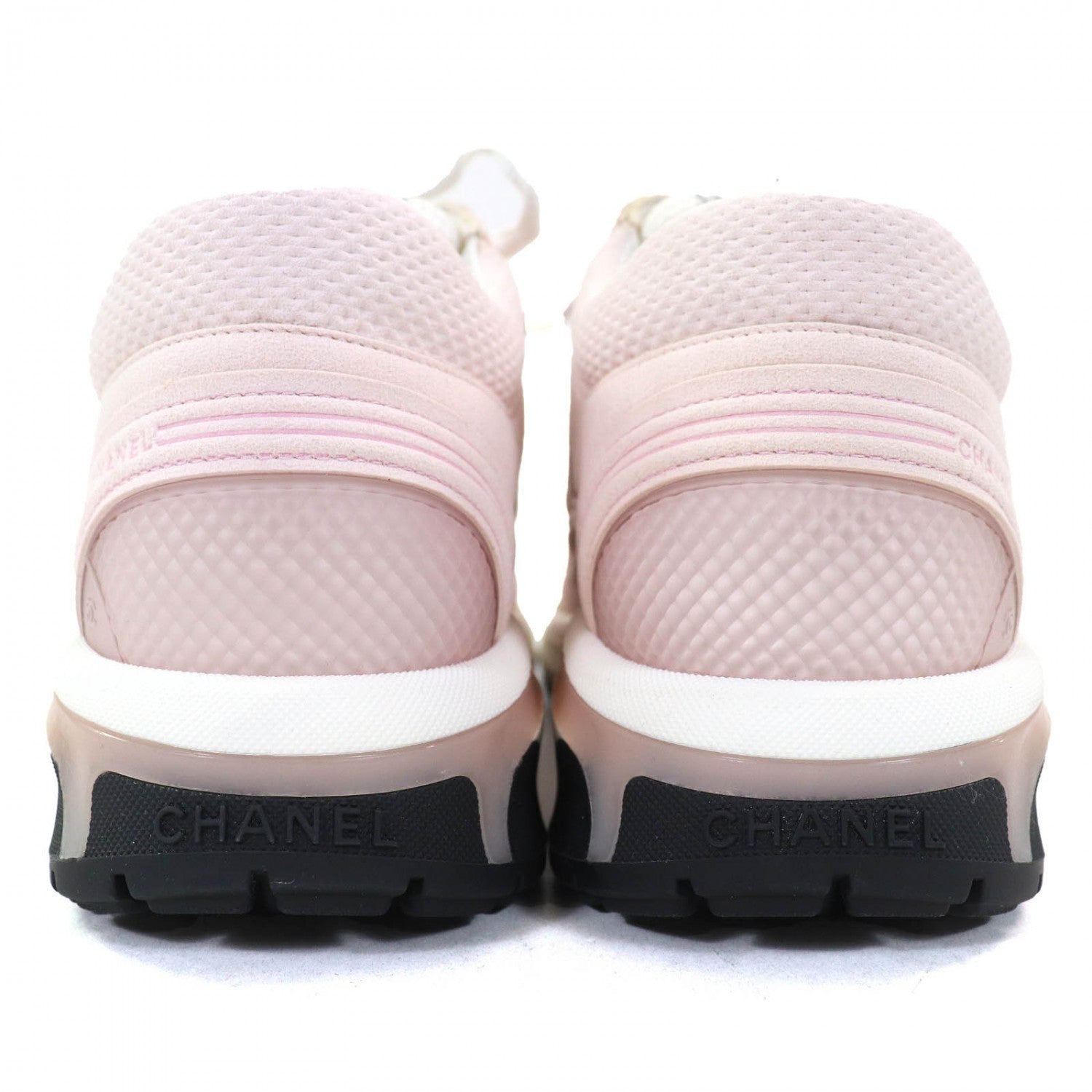 Chanel pink sneakers for women with soft mesh detailing and cushioned soles for comfort