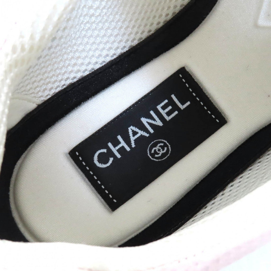 Chanel pink sneakers for women showcasing a stylish inner label and breathable design