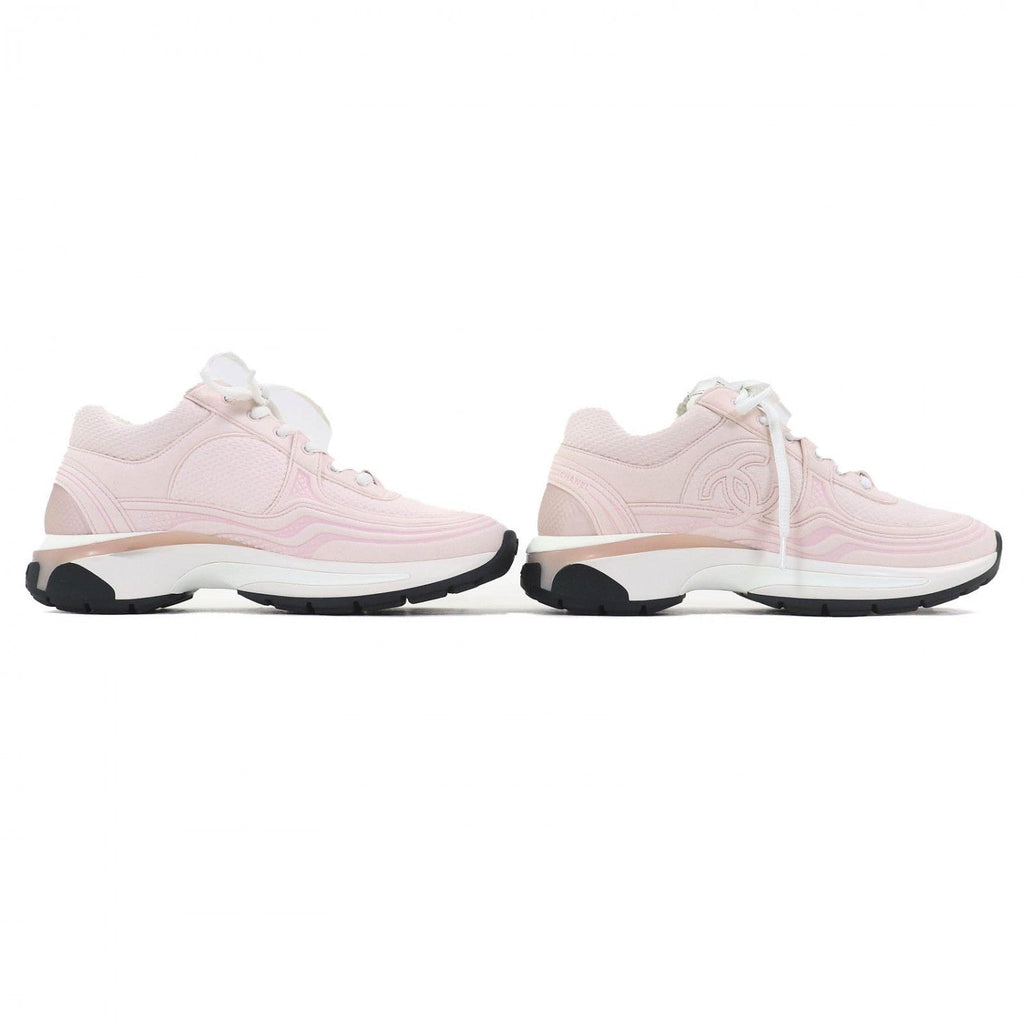 Chanel pink sneakers for women featuring a lightweight design and stylish logo detailing