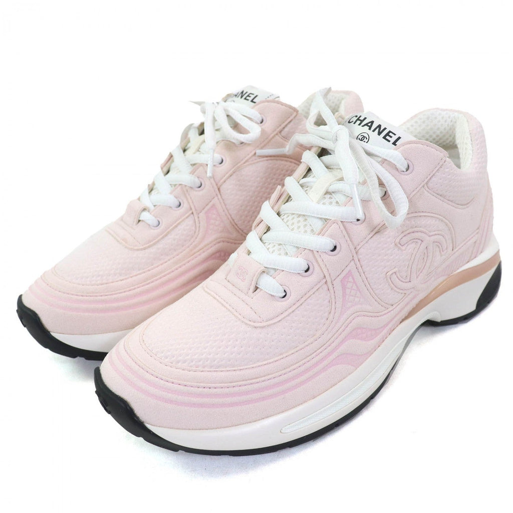 Chanel pink sneakers for women featuring a stylish design and comfortable fit
